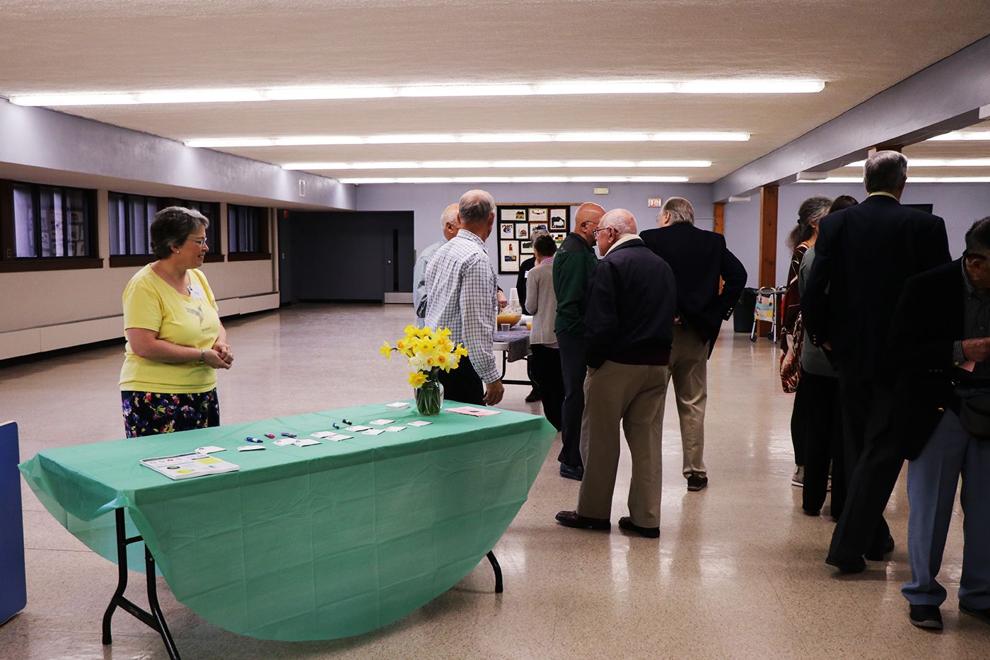 CVIP luncheon. Entrance to basement where luncheon was held. Pictured is table with brochures and information.