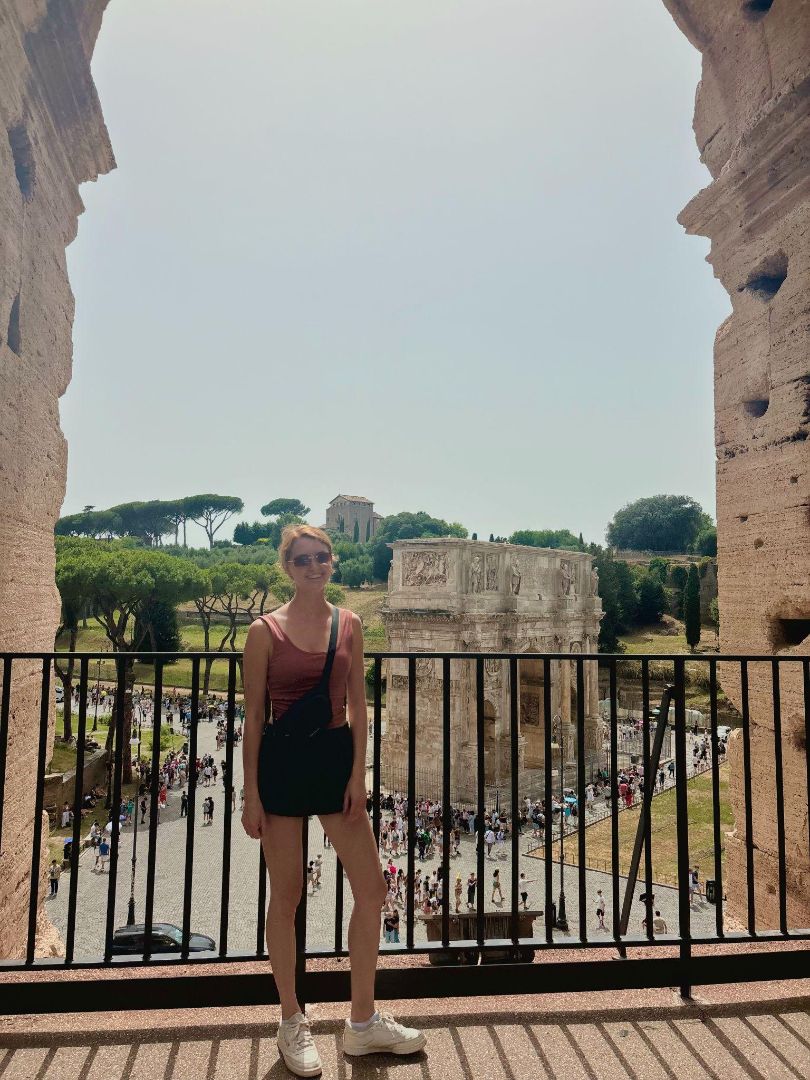 Katharina posing in front of the Roman Forum in Italy