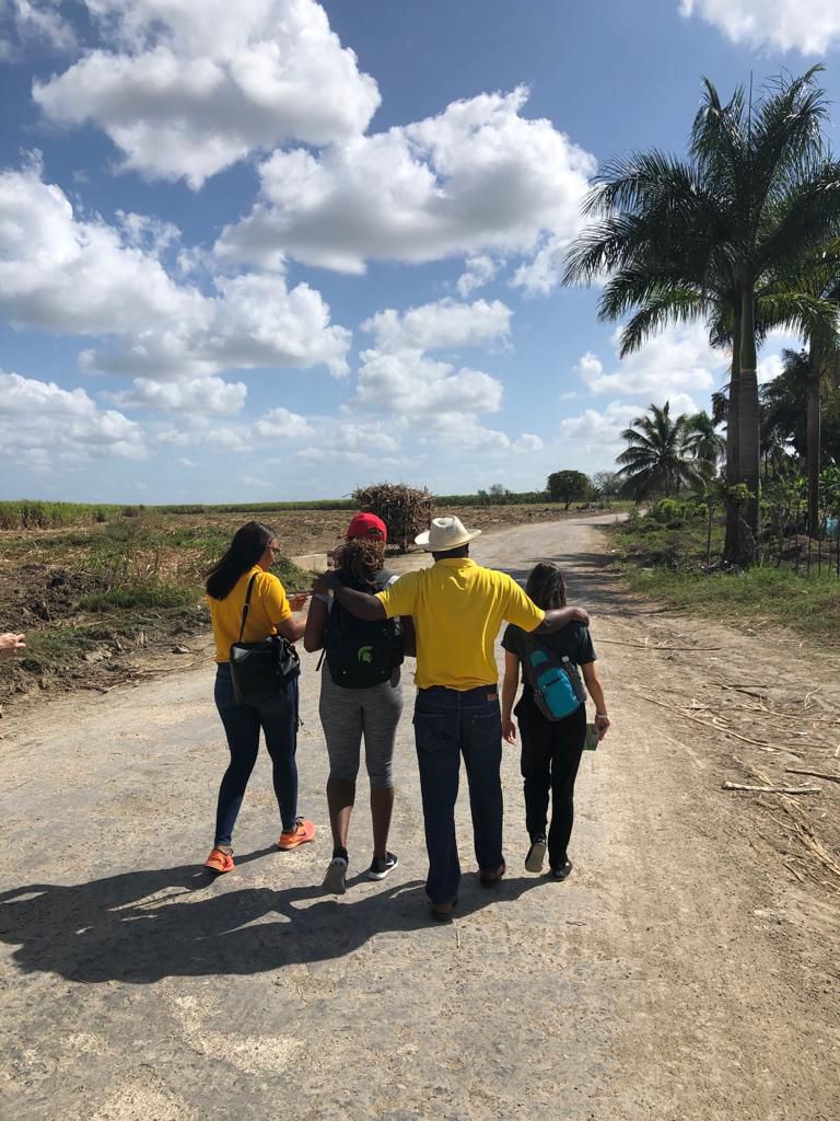 Students walking down dirt road in the Dominican Republic