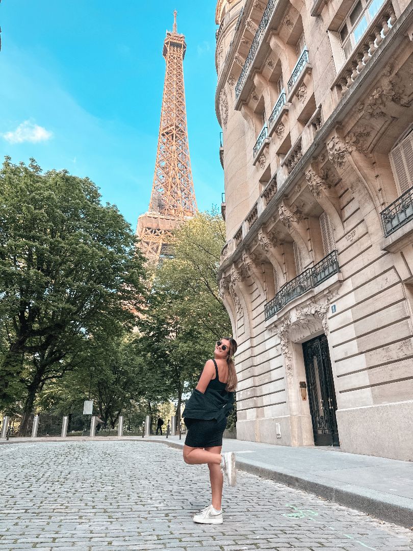 Anna in Paris with Eiffel Tower in the background