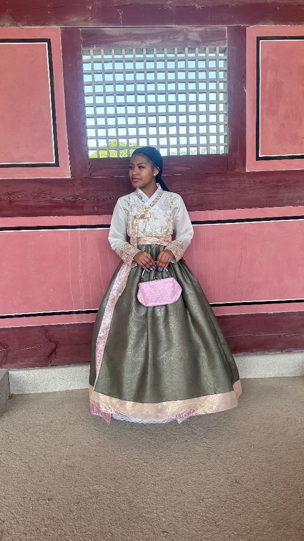 Quenita wearing a traditional Korean dress