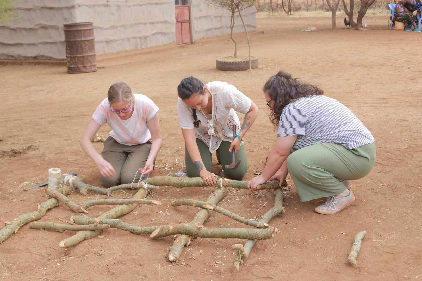 MSU students helping build a structure in Tanzania