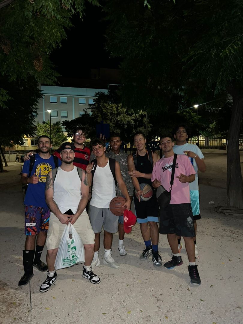Zaviah and friends pose after an evening of basketball